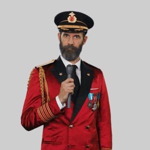 Animated GIF of a man with a beard in a red jacket with military insignia dropping a microphone, shrugging, and walking off.