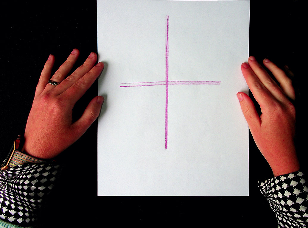A piece of paper with a giant plus sign.